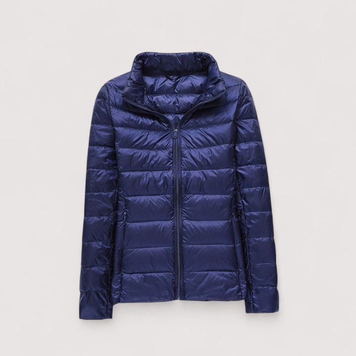 Lightweight women's puffer jacket, chic & warm outerwear for elegant winter fashion.