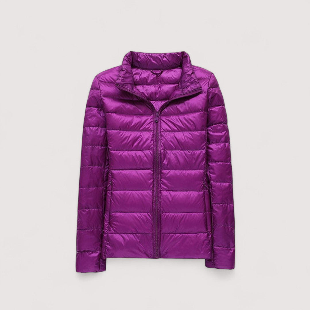 Insulated women's winter jacket, ultralight design, offering cozy cold weather protection.