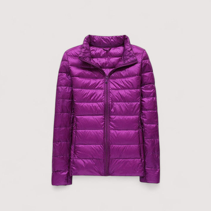 Insulated women's winter jacket, ultralight design, offering cozy cold weather protection.