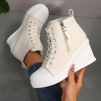 Fashionable women's hidden wedge sneakers, offering a platform aesthetic and comfortable elevated style.