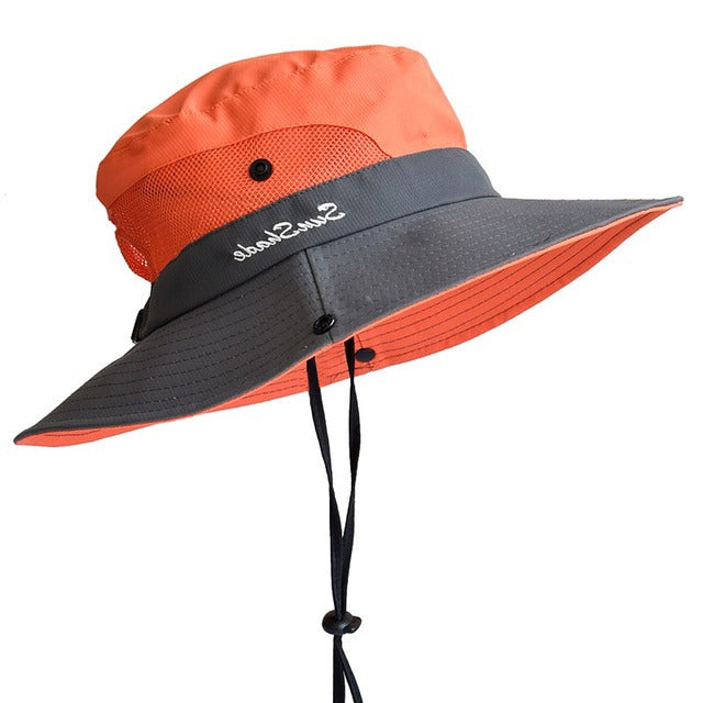 Stylish women's UV protection beach hat, foldable & adjustable for travel convenience.