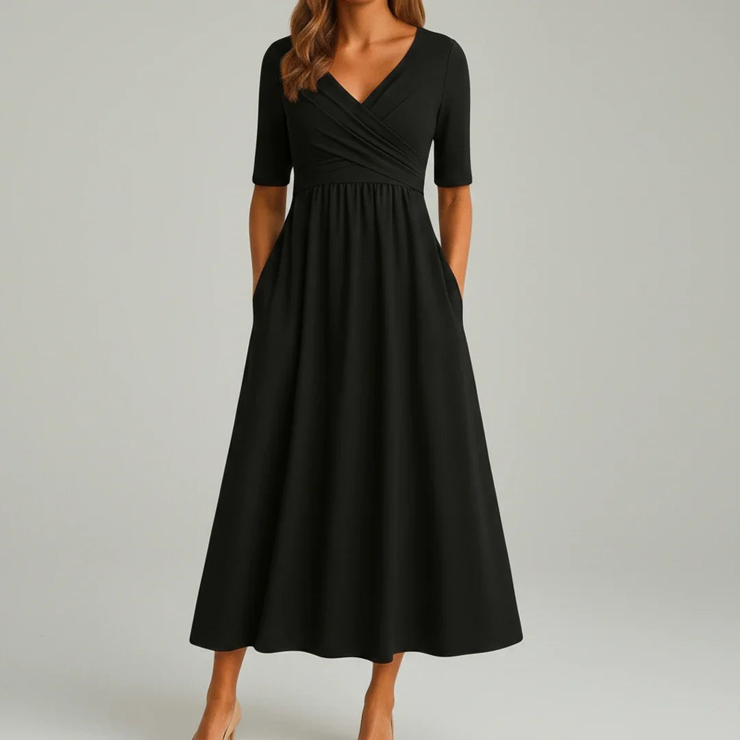 Elegant women's V-neck A-line midi dress, featuring a flattering fit, comfortable fabric, & practical pockets.