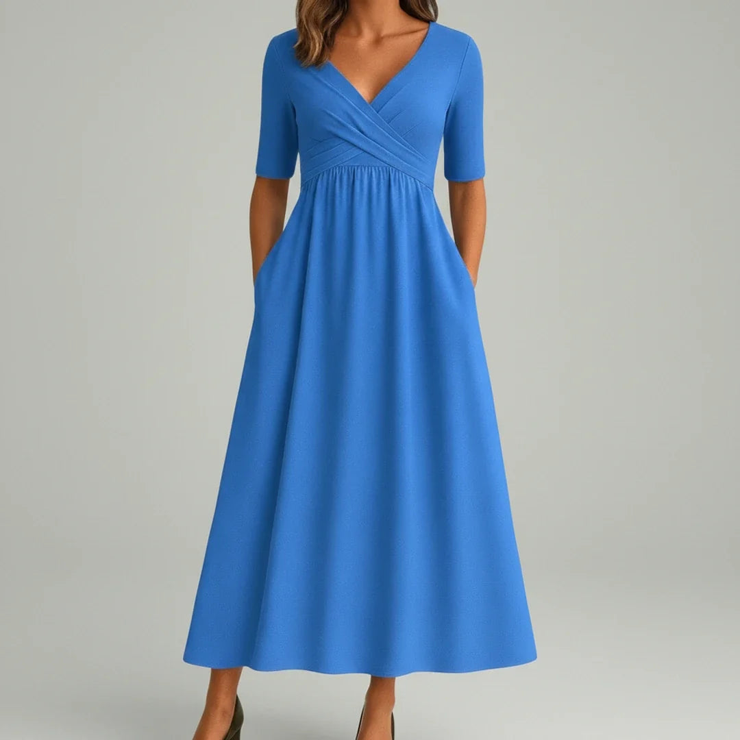Casual women's V-neck midi dress with pockets, ideal for comfortable everyday wear & stylish summer outings.