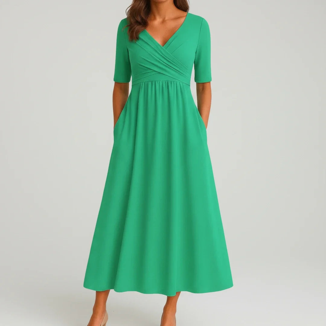 Comfortable women's V-neck A-line midi dress with pockets, a versatile fashion piece for spring & summer wear.