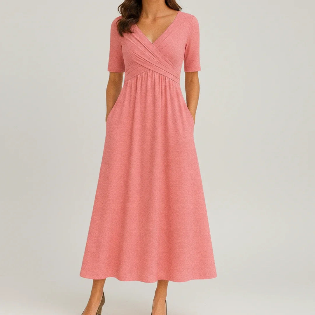 Flattering V-neck A-line midi dress for women, featuring a comfortable design & essential pockets for daily wear.