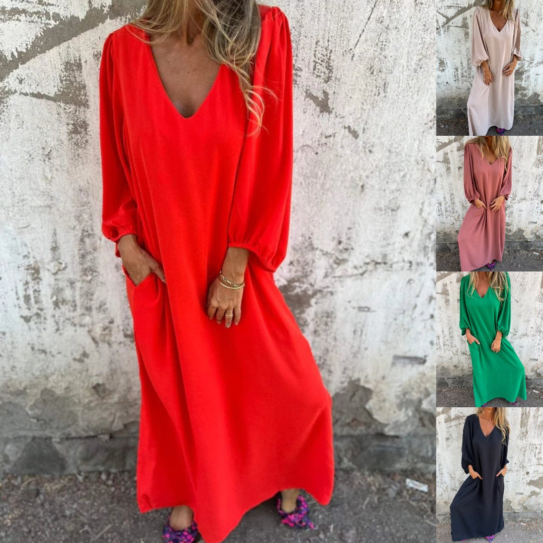 Versatile women's flowy maxi dress with V-neck, balloon sleeves, and practical pockets for casual or party wear.