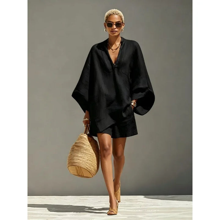 Stylish women's beige V-neck batwing sleeve shorts set. Perfect casual summer vacation outfit or loungewear.
