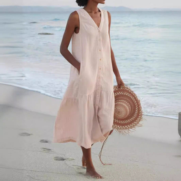 Women's V-neck button front tiered midi dress. Sleeveless, perfect for summer casual wear.