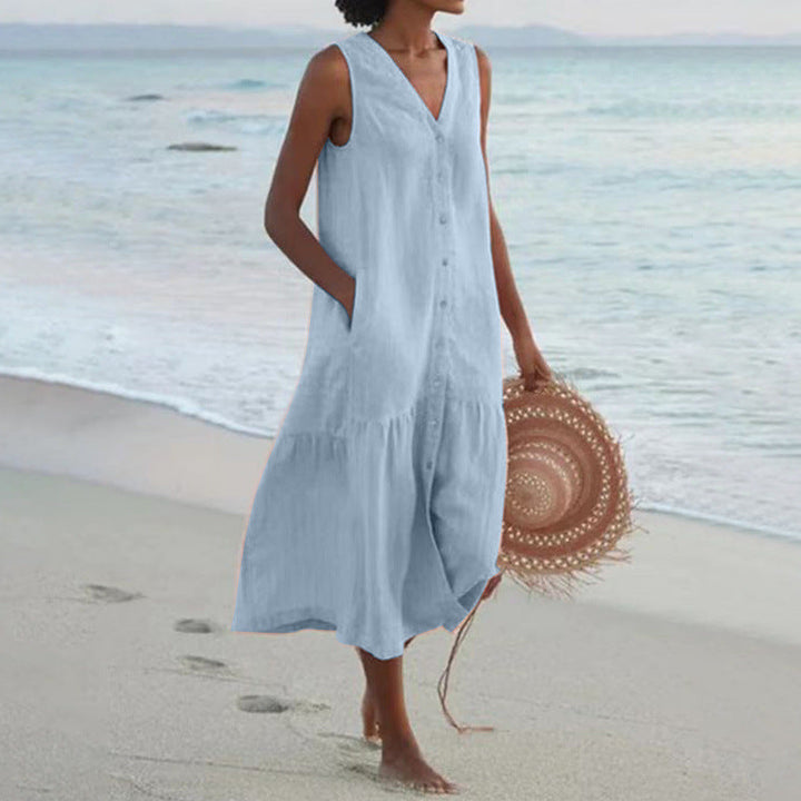 Women's breezy sleeveless V-neck button front tiered midi dress. Ideal for summer casual & vacation.