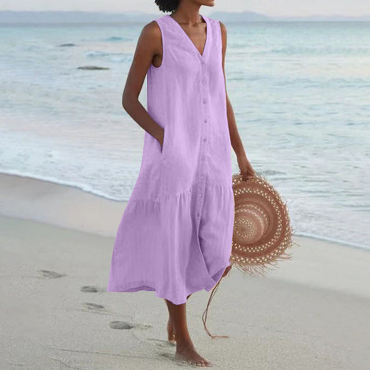 Summer-ready women's tiered midi dress. V-neck, button front, sleeveless, relaxed fit for ultimate comfort.