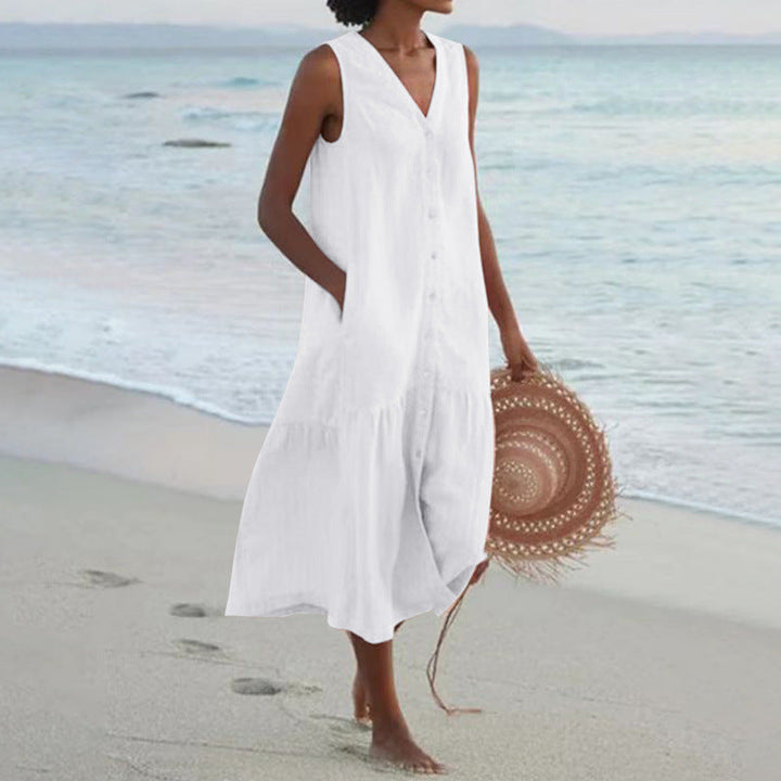 Breezy women's sleeveless V-neck tiered midi dress with functional button front & pockets.