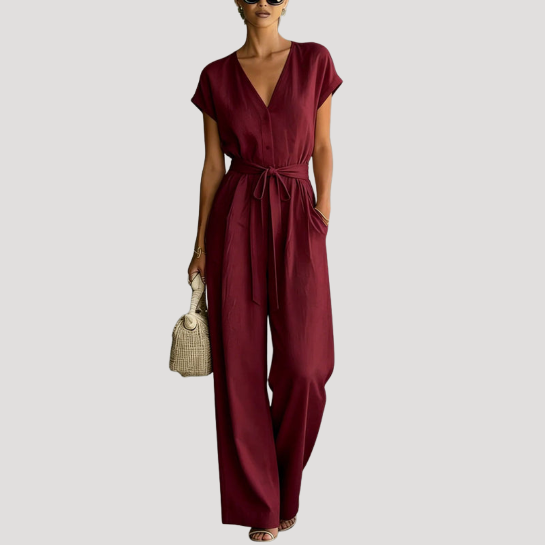 Chic women's V-neck cap sleeve wide-leg jumpsuit with a stylish tie waist. Comfortable and elegant one-piece for summer.