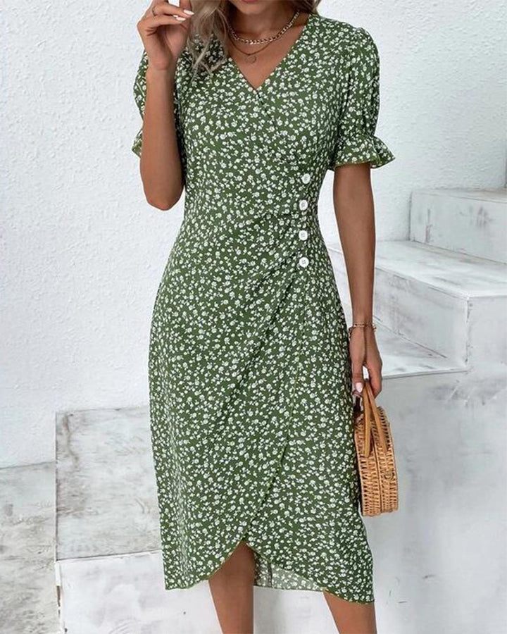 Women's V-neck floral flowy midi summer dress. Elegant casual spring attire, perfect for warm weather.