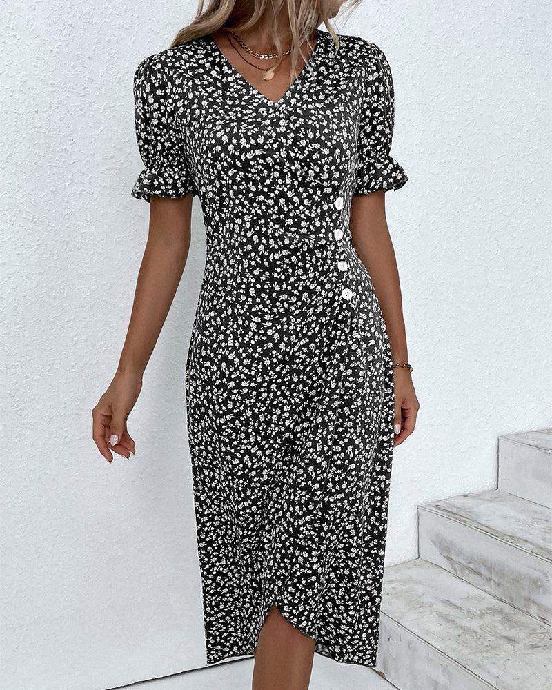 Women's floral print V-neck flowy summer midi dress. A versatile, casual elegant piece for spring wardrobes.
