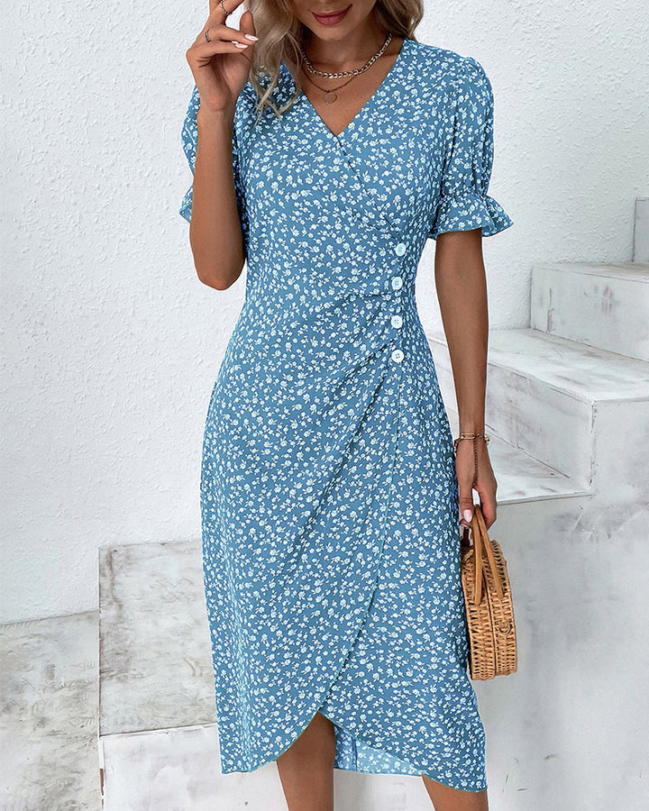 Front view of women's floral print V-neck flowy summer midi dress. Ideal for spring casual elegance.