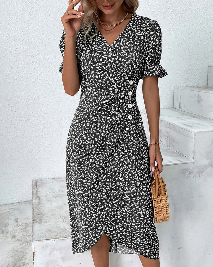 Back view of elegant women's floral flowy midi summer dress with stylish V-neck. Perfect for spring.