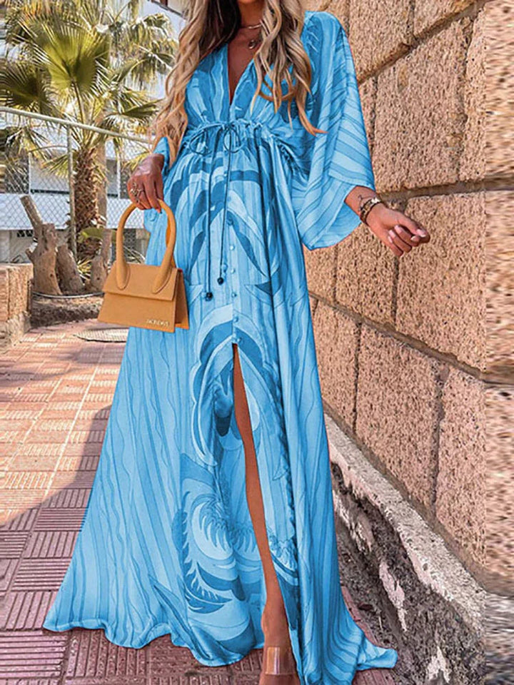 Flowy women's summer maxi dress featuring a chic V-neck, kimono sleeves, and a stylish high slit.