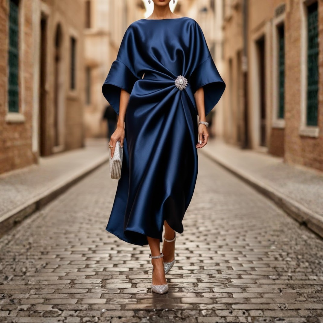 Women's V-neck midi dress with a flowing flared skirt, elbow sleeves, and convenient pockets.