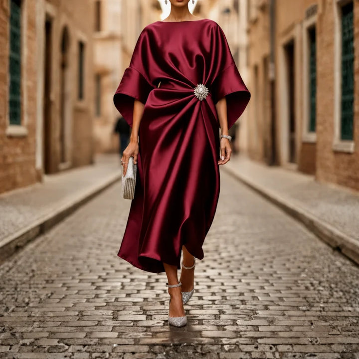 Elegant women's V-neck midi dress, perfect for casual or occasion wear, featuring a flattering flared skirt.
