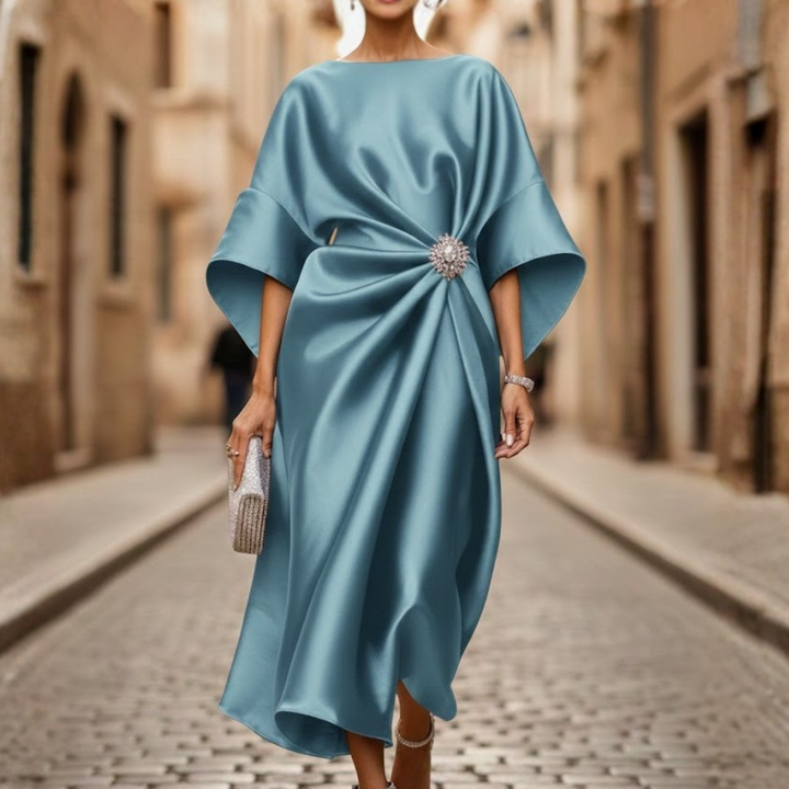 Comfortable women's spring/summer V-neck midi dress with a versatile flared skirt and practical pockets.