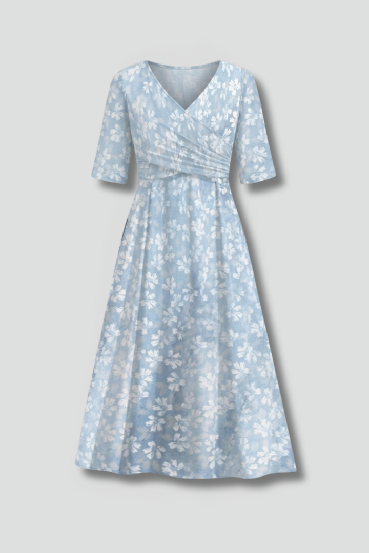 Women's V-neck midi dress with short sleeves & practical pockets, ideal for comfortable everyday wear.