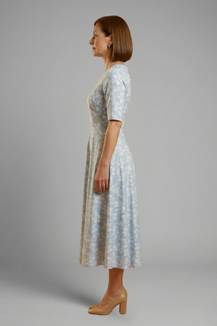 Relaxed fit V-neck midi dress for women with short sleeves & functional pockets. A versatile & comfortable everyday dress.