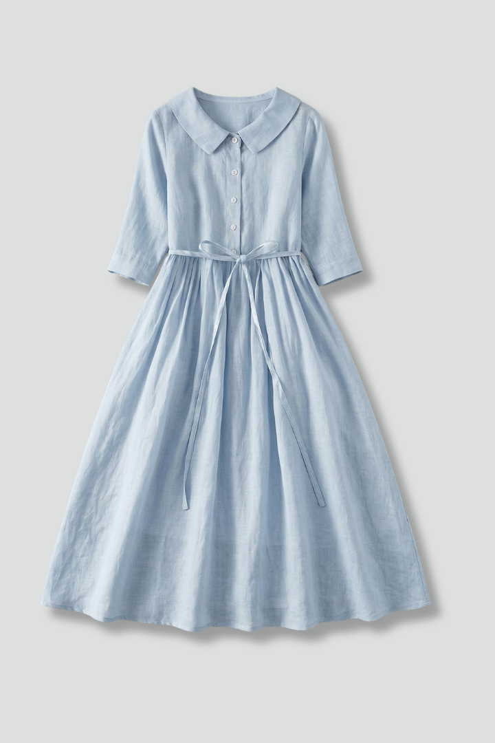 Women's V-neck midi dress with waist tie, a flattering & versatile piece for any occasion.