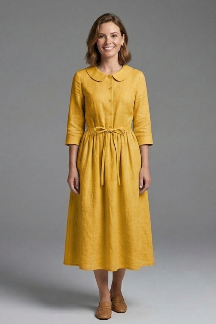Comfortable & colorful women's midi dress, featuring a stylish V-neck and waist tie detail.