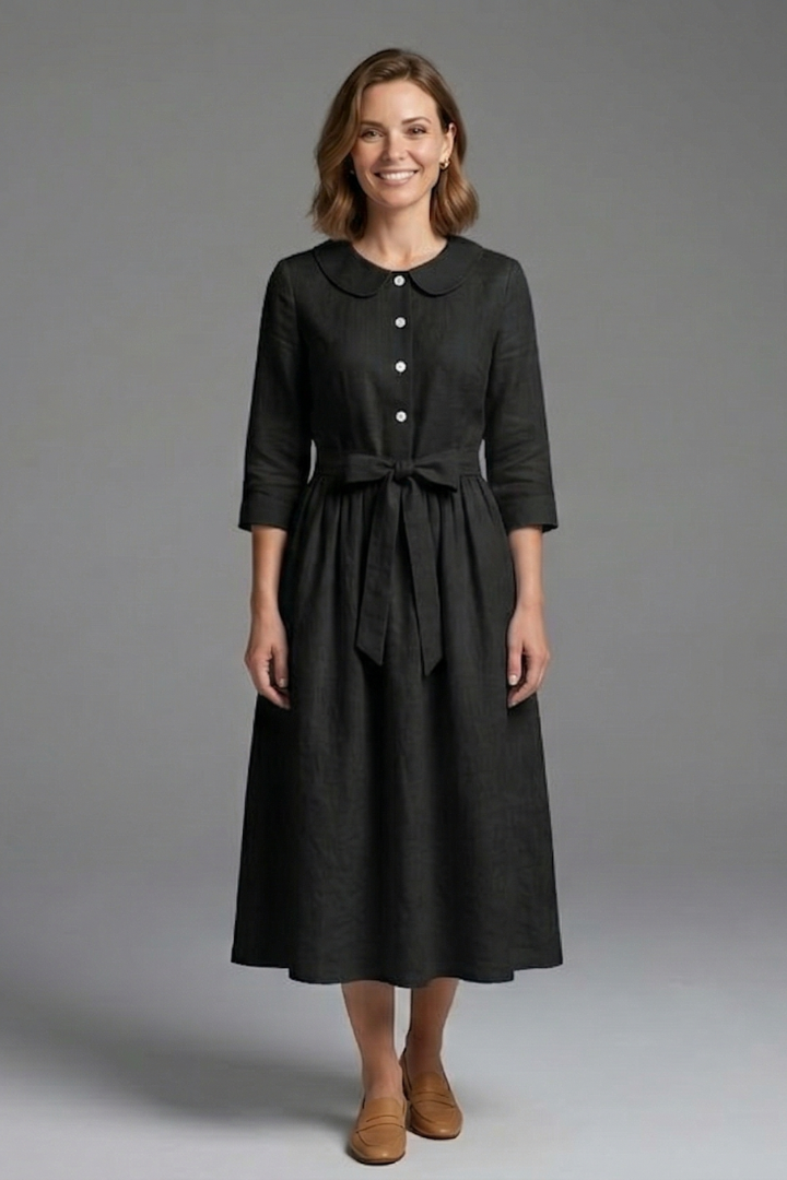 Flattering V-neck midi dress for women, accentuating the neckline with a stylish waist tie.