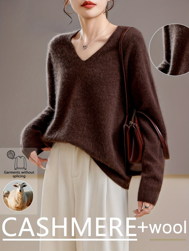 Women's V-neck oversized sweater for elegant autumn layering, warm knit, comfortable chic style.