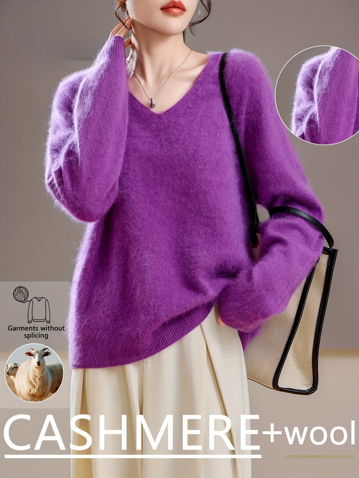 Soft grey women's V-neck knit sweater, perfect for comfortable autumn layering and chic winter fashion.