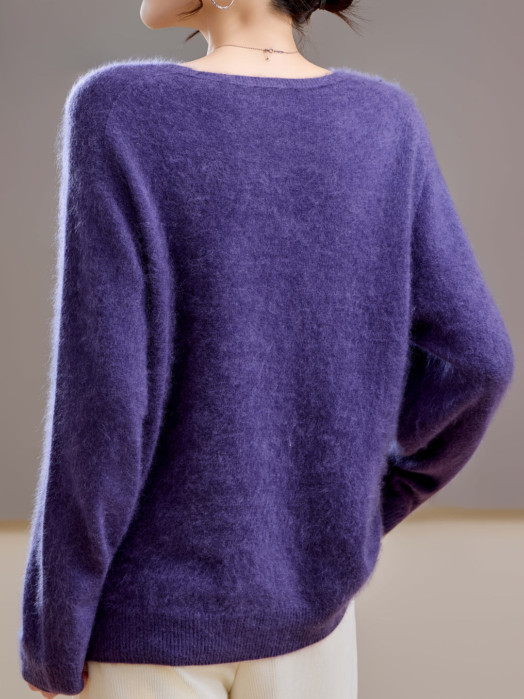 Chic women's V-neck sweater, a must-have for autumn layering. Warm knit, comfortable & elegant style.