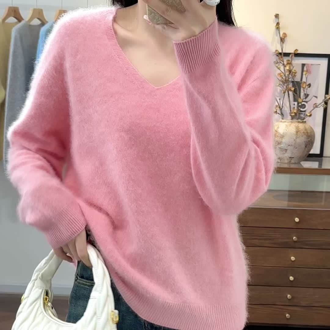 Relaxed fit V-neck women's sweater for ultimate comfort. Elegant, warm knit, perfect for autumn layering.