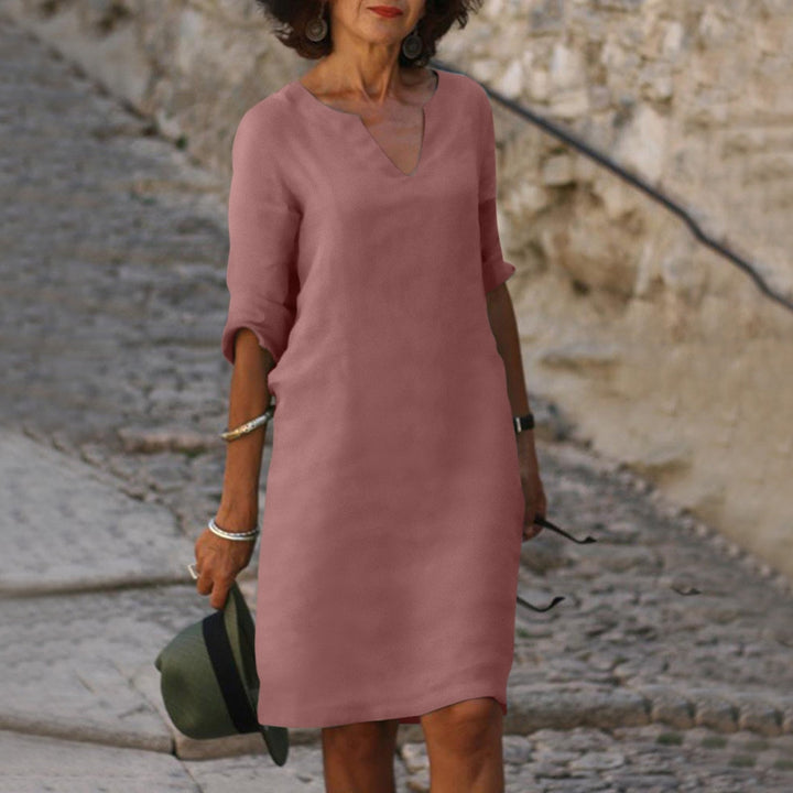 Women's V-neck relaxed fit midi dress with three-quarter sleeves, for stylish summer comfort.