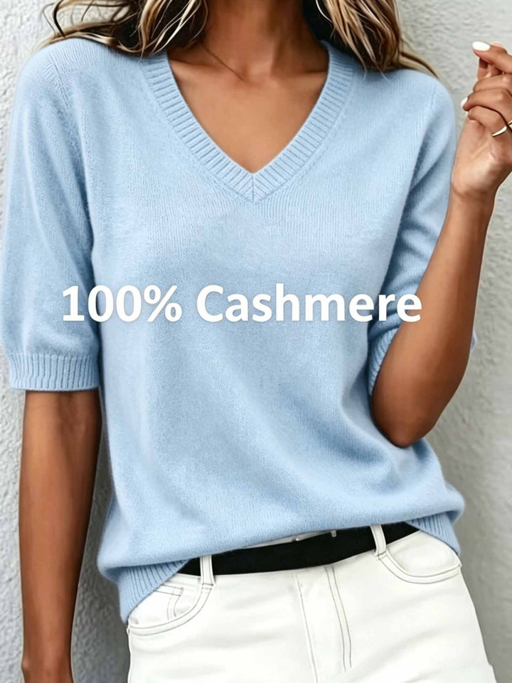 Black V-neck short-sleeve sweater. Elegant women's knit top, a versatile layering piece for any look.