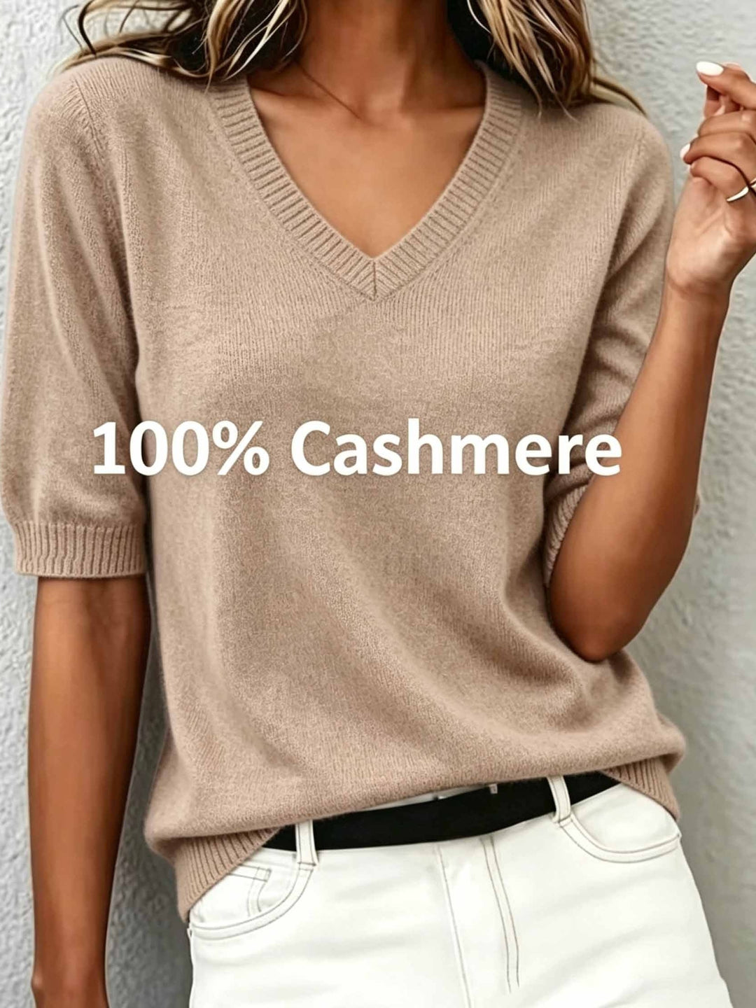 Stylish V-neck short-sleeve sweater for women. Elegant knit top, perfect for smart casual or office style.