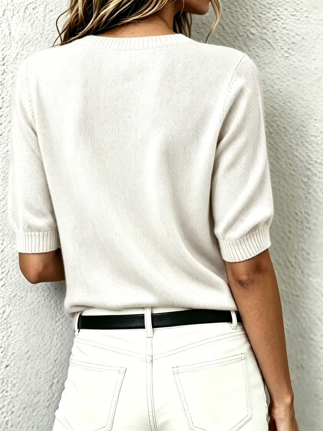 Everyday women's V-neck short-sleeve sweater. Versatile layering knit top for smart casual or office.