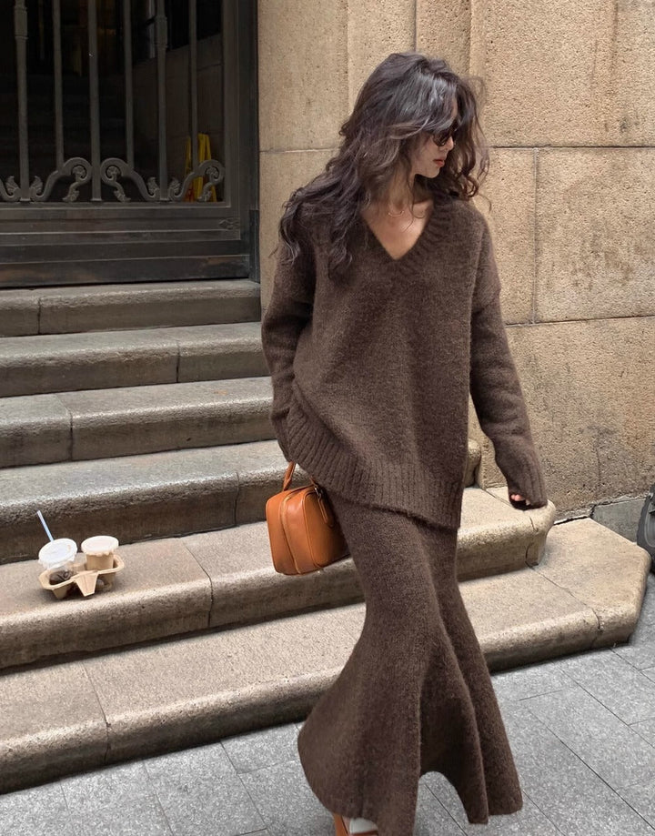 Women's V-Neck Sweater & Midi Skirt Matching Set. Long sleeve, coordinated two-piece outfit.
