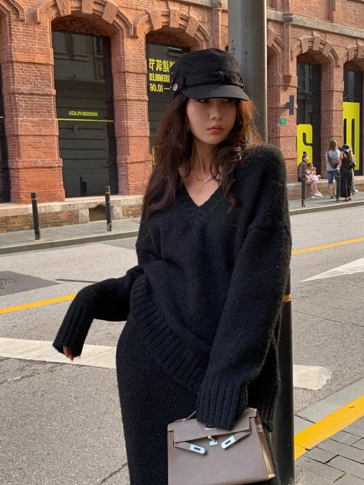 Women's elegant midi skirt and V-neck long sleeve sweater matching set. Comfortable two-piece outfit.