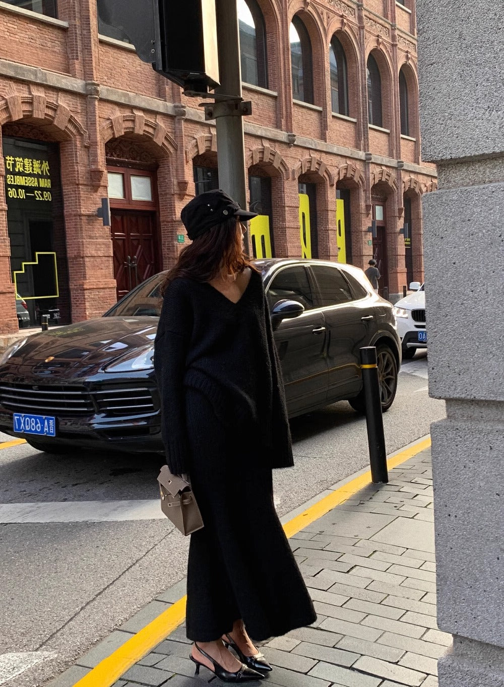 Long sleeve V-neck sweater with coordinating midi skirt. Women's comfortable matching two-piece set.