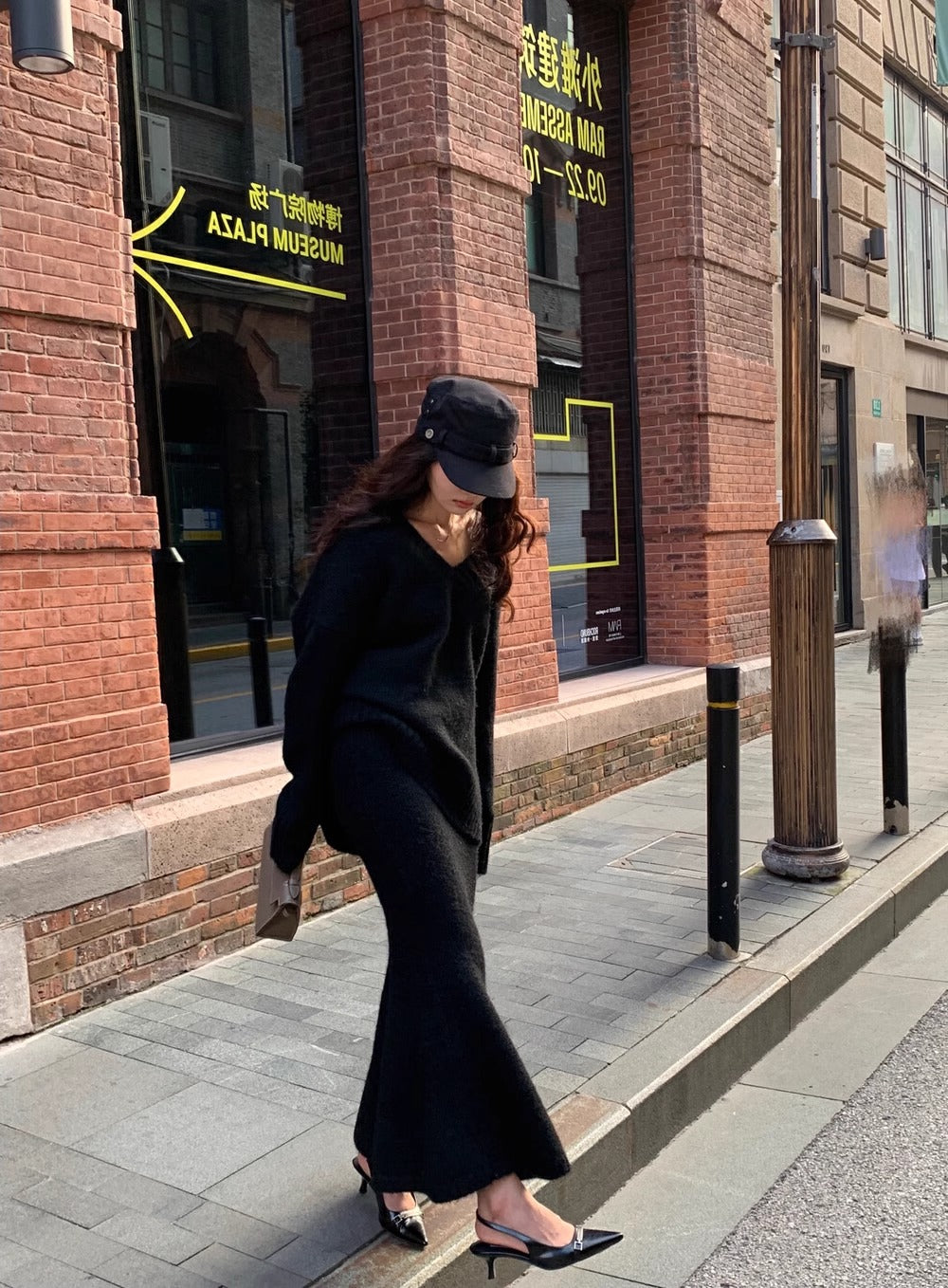 Coordinated women's V-neck long sleeve sweater & midi skirt matching set. Elegant, comfortable, and versatile fashion.