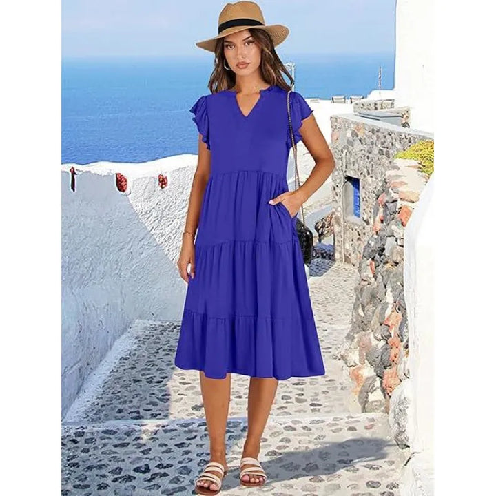 Women's V-neck tiered midi dress with elegant flutter sleeves, perfect for summer casual or vacation wear.