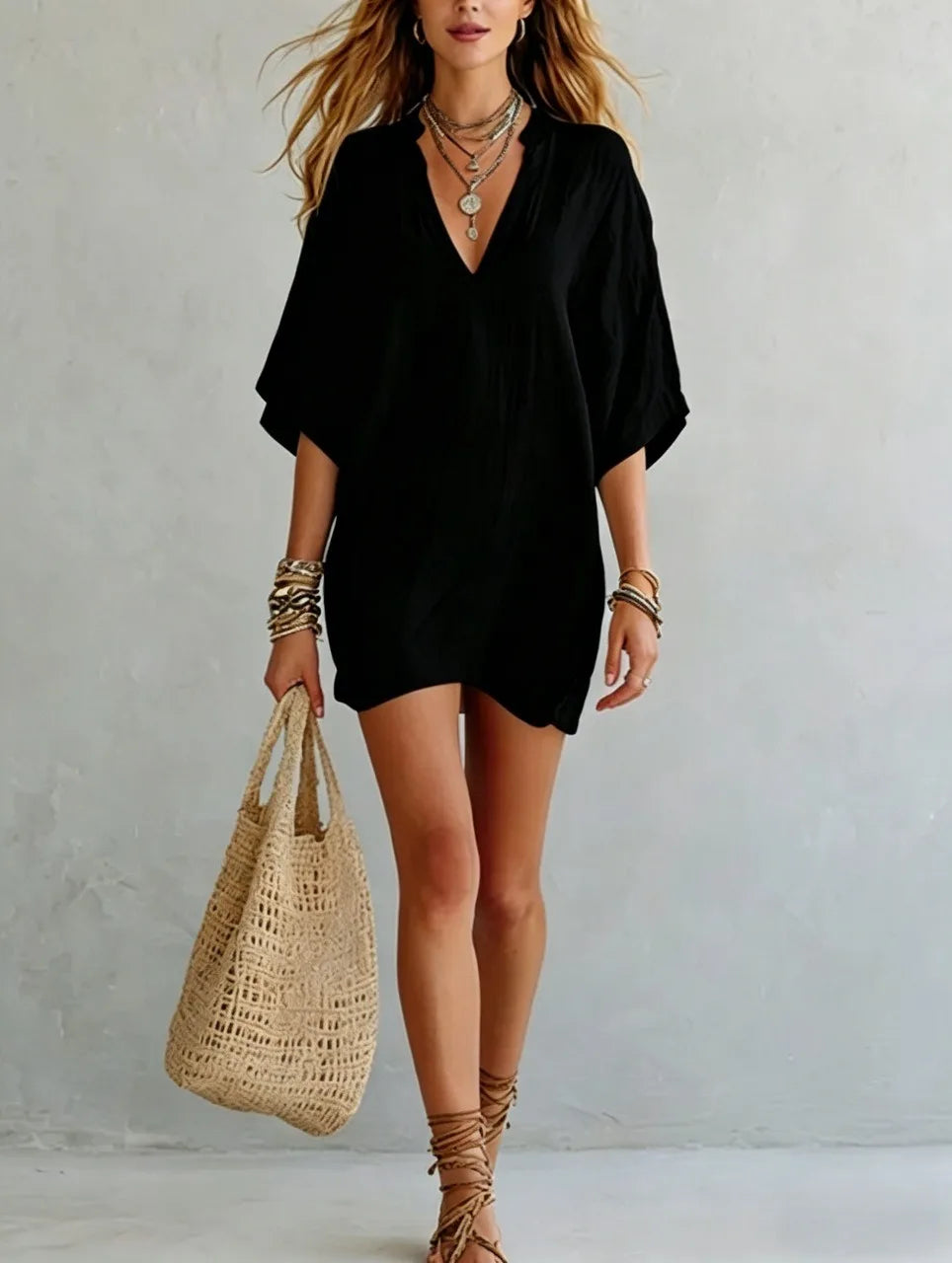 Chic women's V-neck mini tunic dress. Oversized, relaxed fit, perfect for beachwear, holidays, and summer casual.