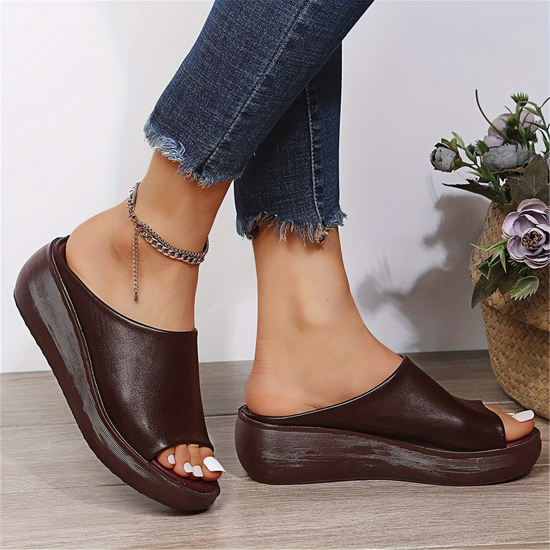 Elegant Valentina women's flat sandals. Stylish open-toe summer slides, perfect chic footwear for daily wear.