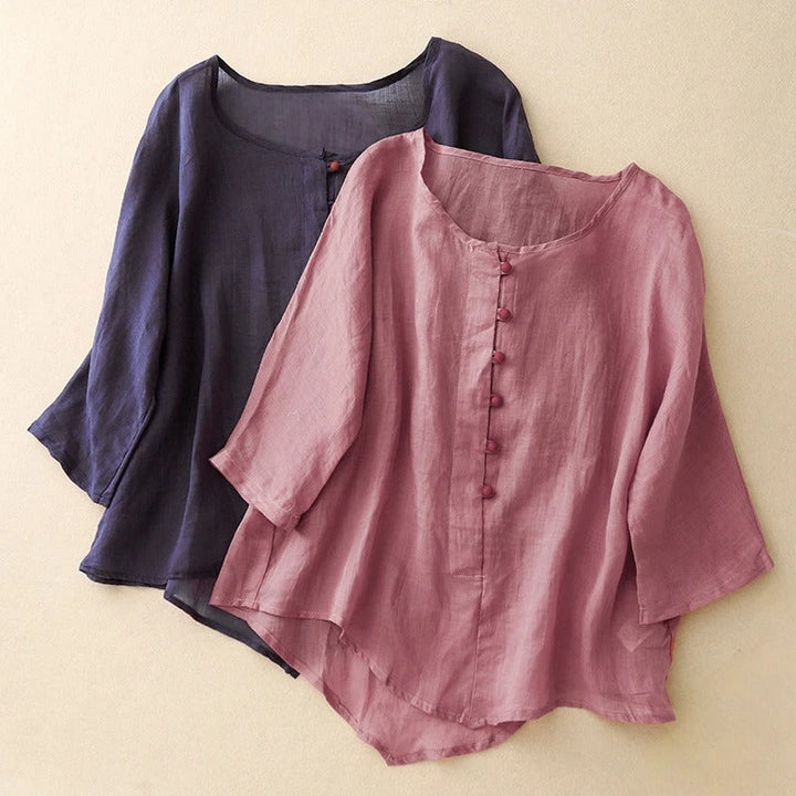 Elegant women's Valeria flowy pleated blouse with button-front, perfect casual chic style for spring fashion.