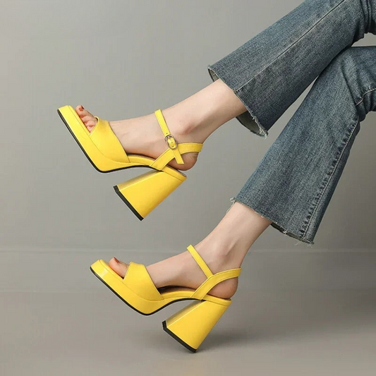 Women's Valetta Gloss Block Heels with elegant ankle strap, perfect for confident strides and dressy occasions.