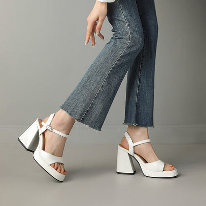 Vibrant Valetta Gloss Block Heels, statement women's footwear with high shine for a bold, fashionable look.
