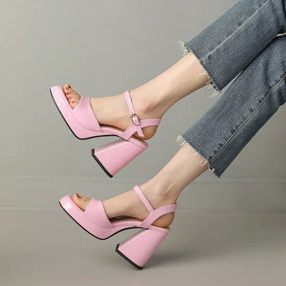Close-up of Valetta Gloss Block Heels, emphasizing the chic ankle strap and luxurious glossy texture.