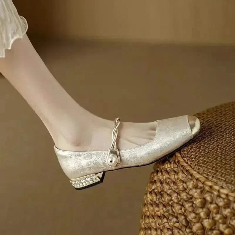 Sophisticated Valoria women's pumps with subtle studded texture & chic square toe, ideal dress heels.