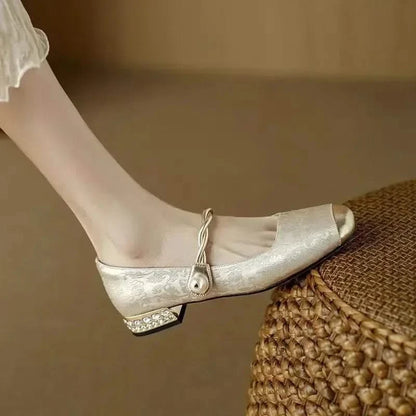 Sophisticated Valoria women's pumps with subtle studded texture & chic square toe, ideal dress heels.